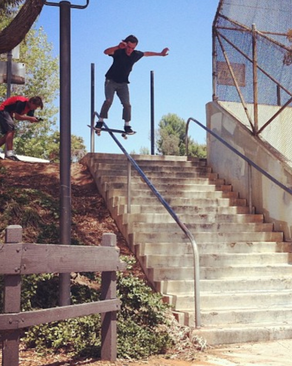 Chris Center Vegetableshredder vegan skateboarder board slide stair case hand rail